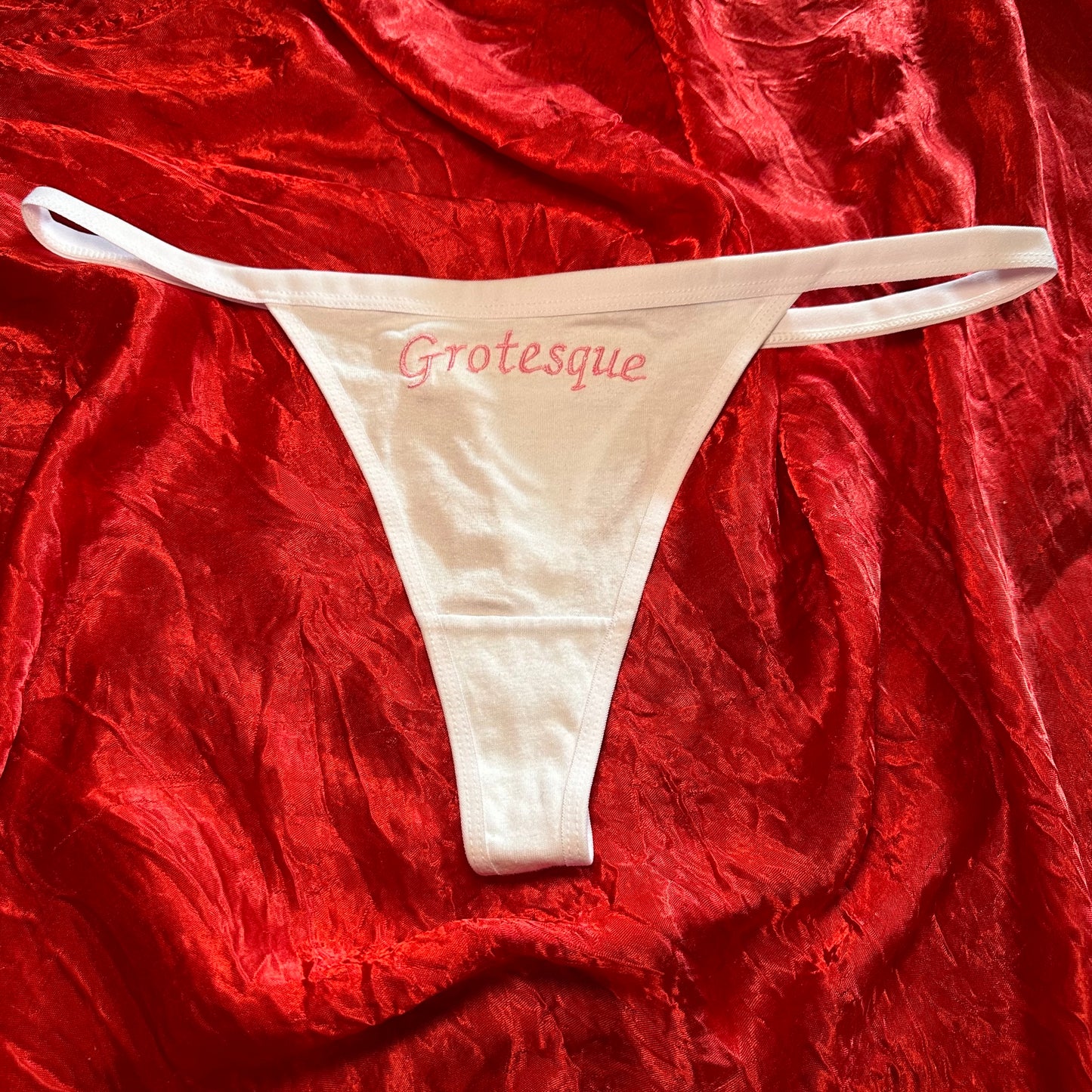 Grotesque Thong (XL) white/pink