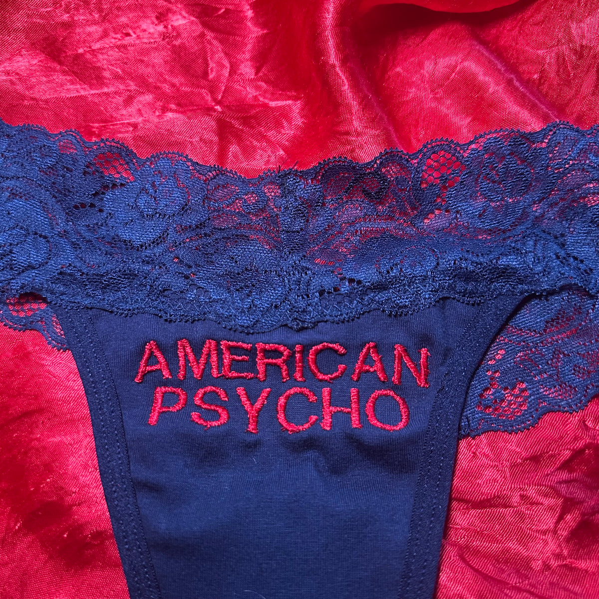 American Psycho Lace Thong (M) navy/red
