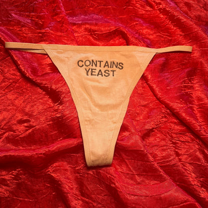 Contains Yeast Thong (L) beige/brown