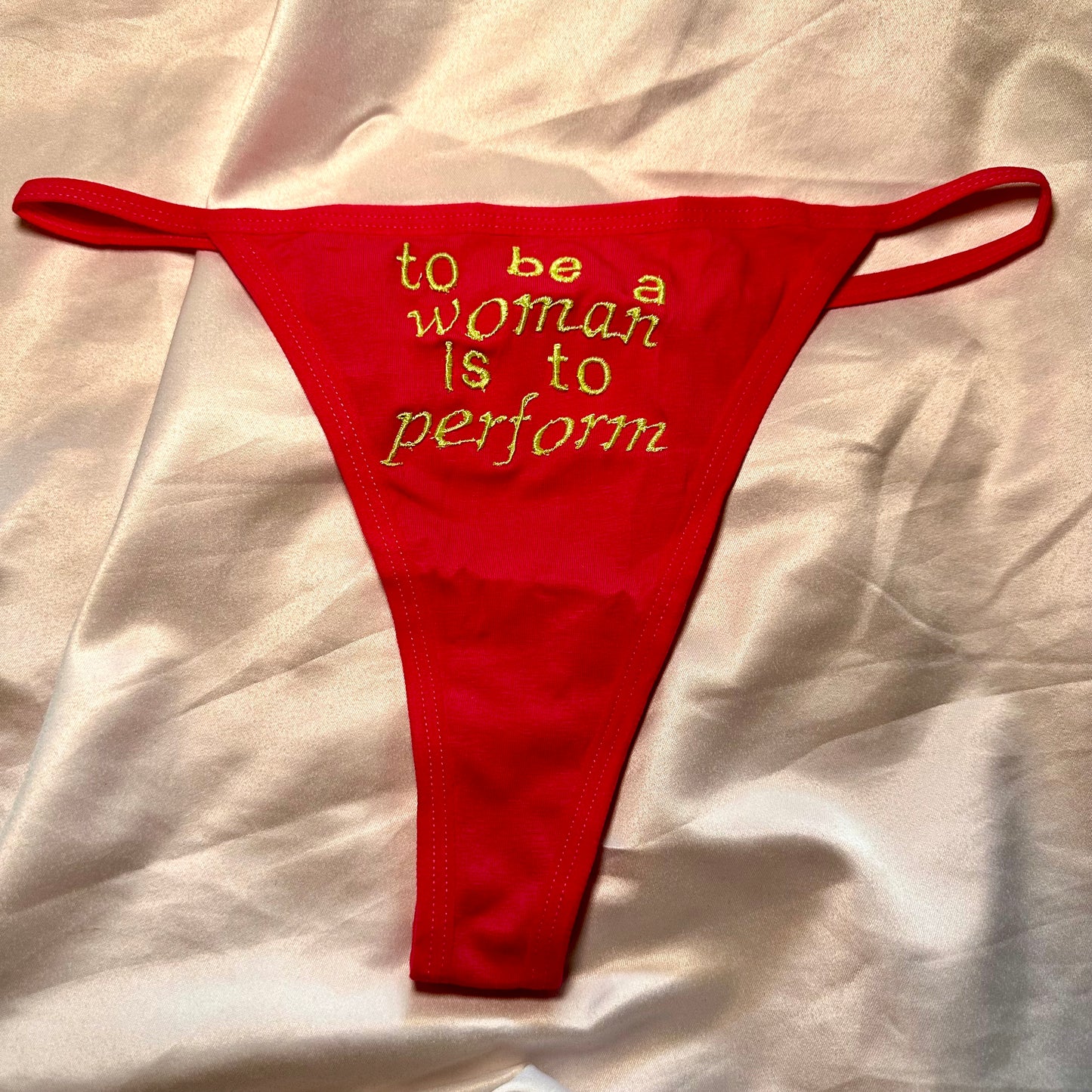 To be a woman is to perform thong (s) pink/green