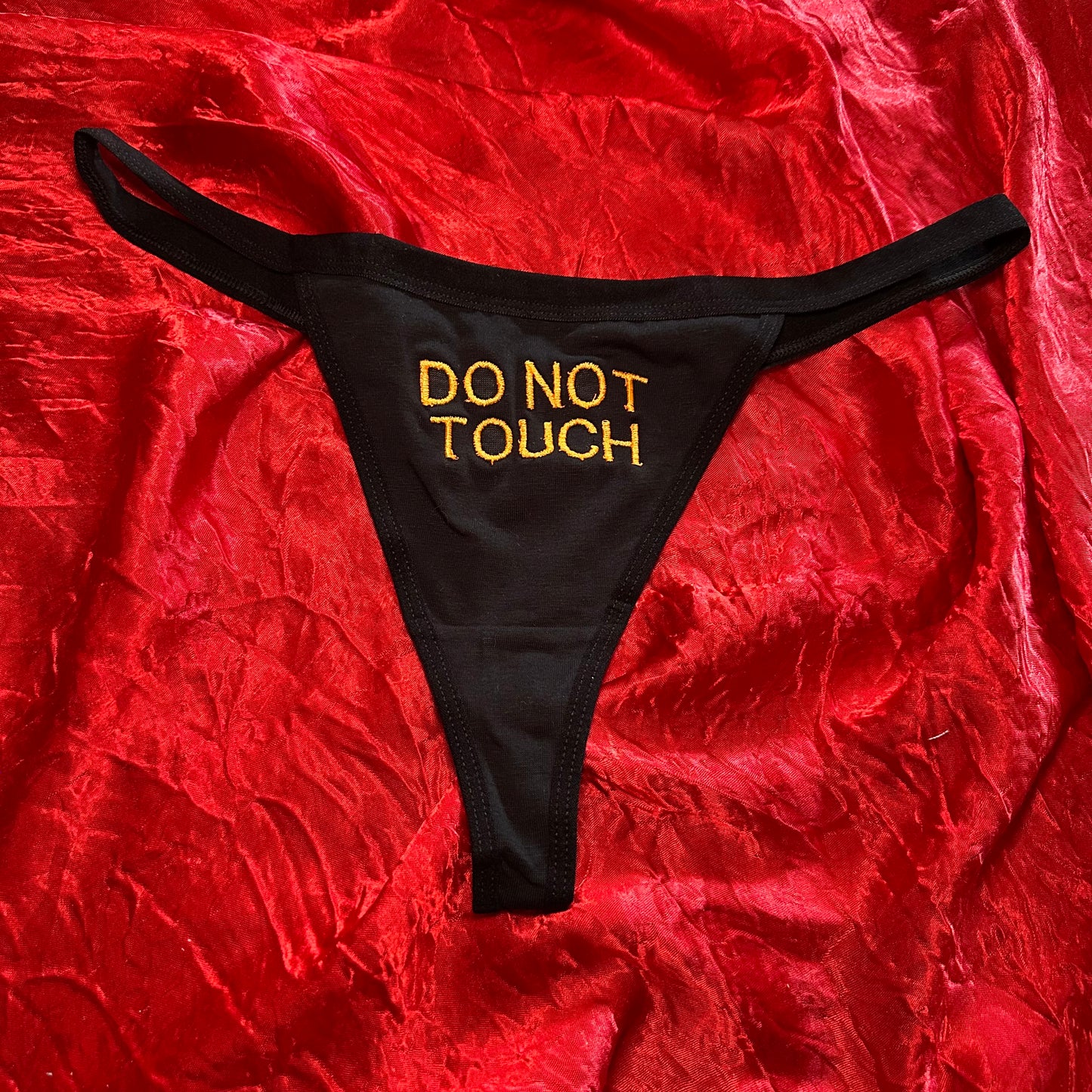 Do Not Touch Thong (XL) black/orange
