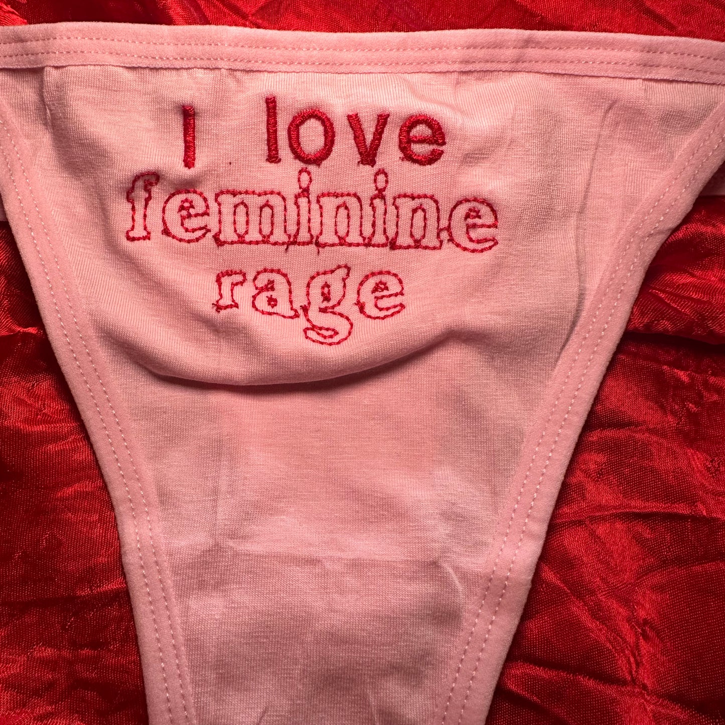 Feminine Rage Thong (L) pink/red