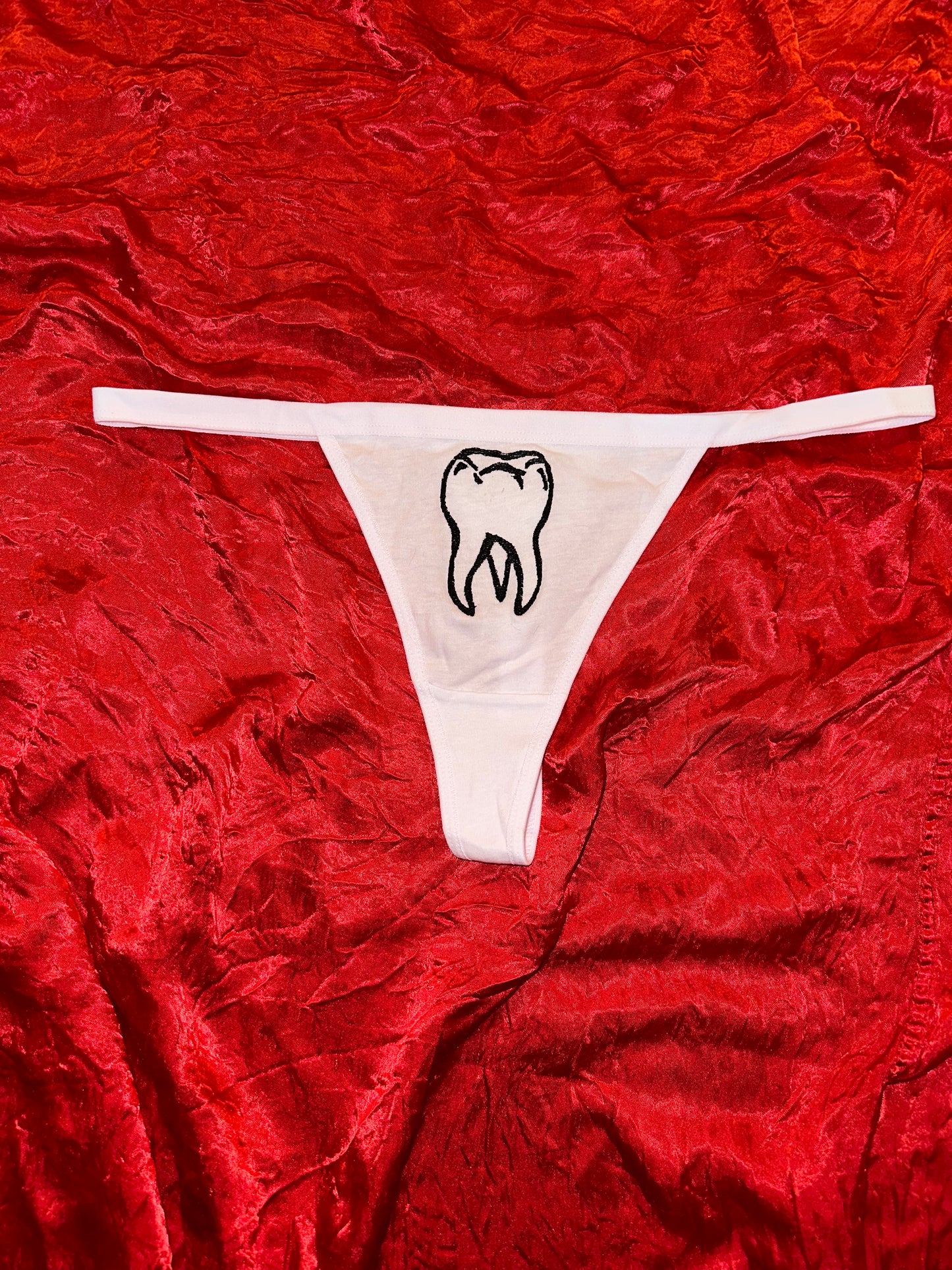 Tooth Thong