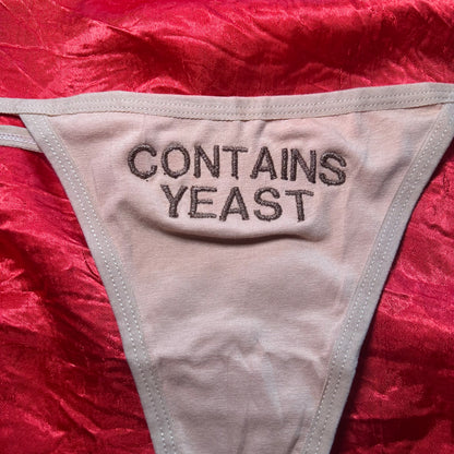 Contains Yeast Thong (S) beige/brown