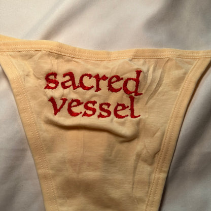 Sacred Vessel Thong (S) beige/red