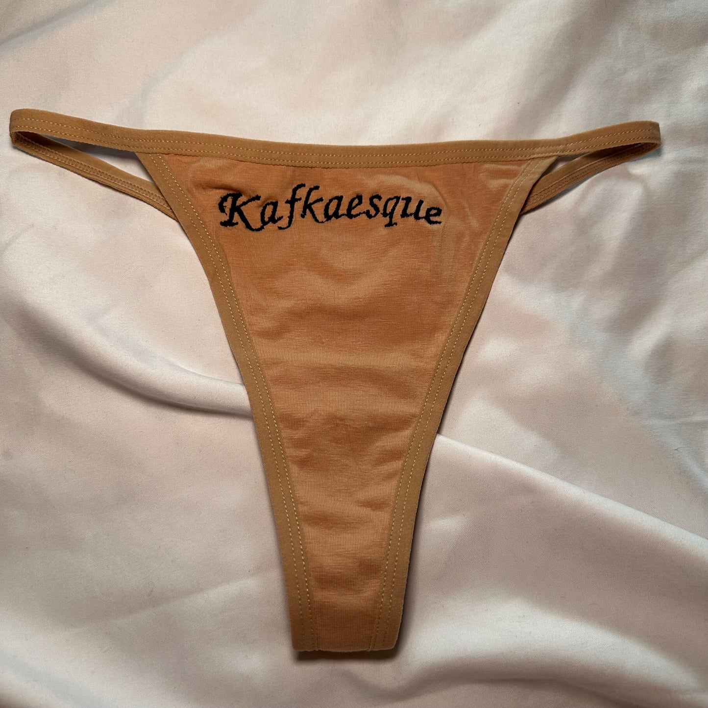 Kafkaesque Thong (S) beige/black