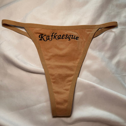 Kafkaesque Thong (S) beige/black